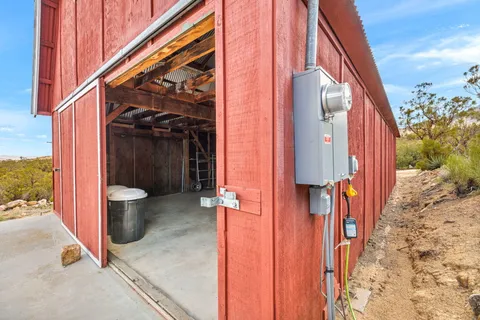 a view of a walk in front of house