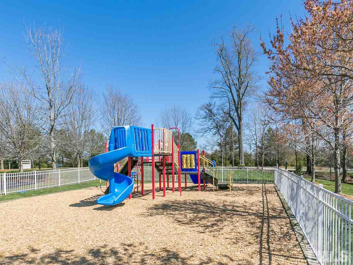 2520 Spruce Shadows Lane Raleigh, NC 27614 - Photo 25 of 25 a view of a park with iron fence