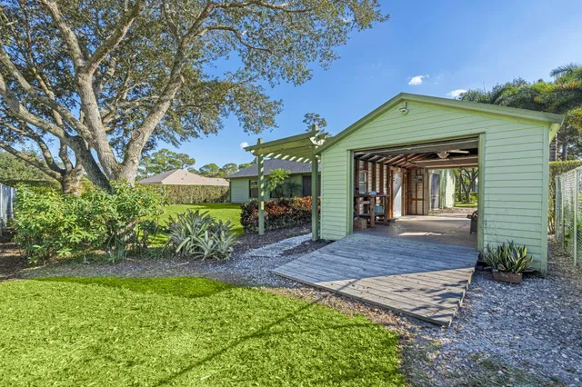 a view of a park with large trees