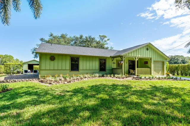 a view of a park with large trees