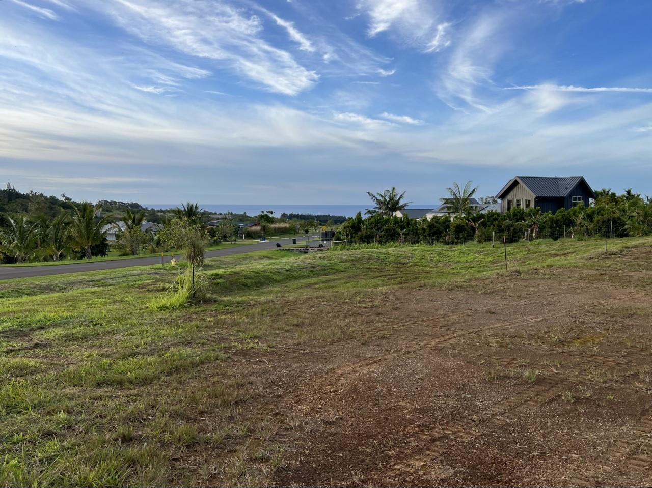 a view of a golf course with a yard