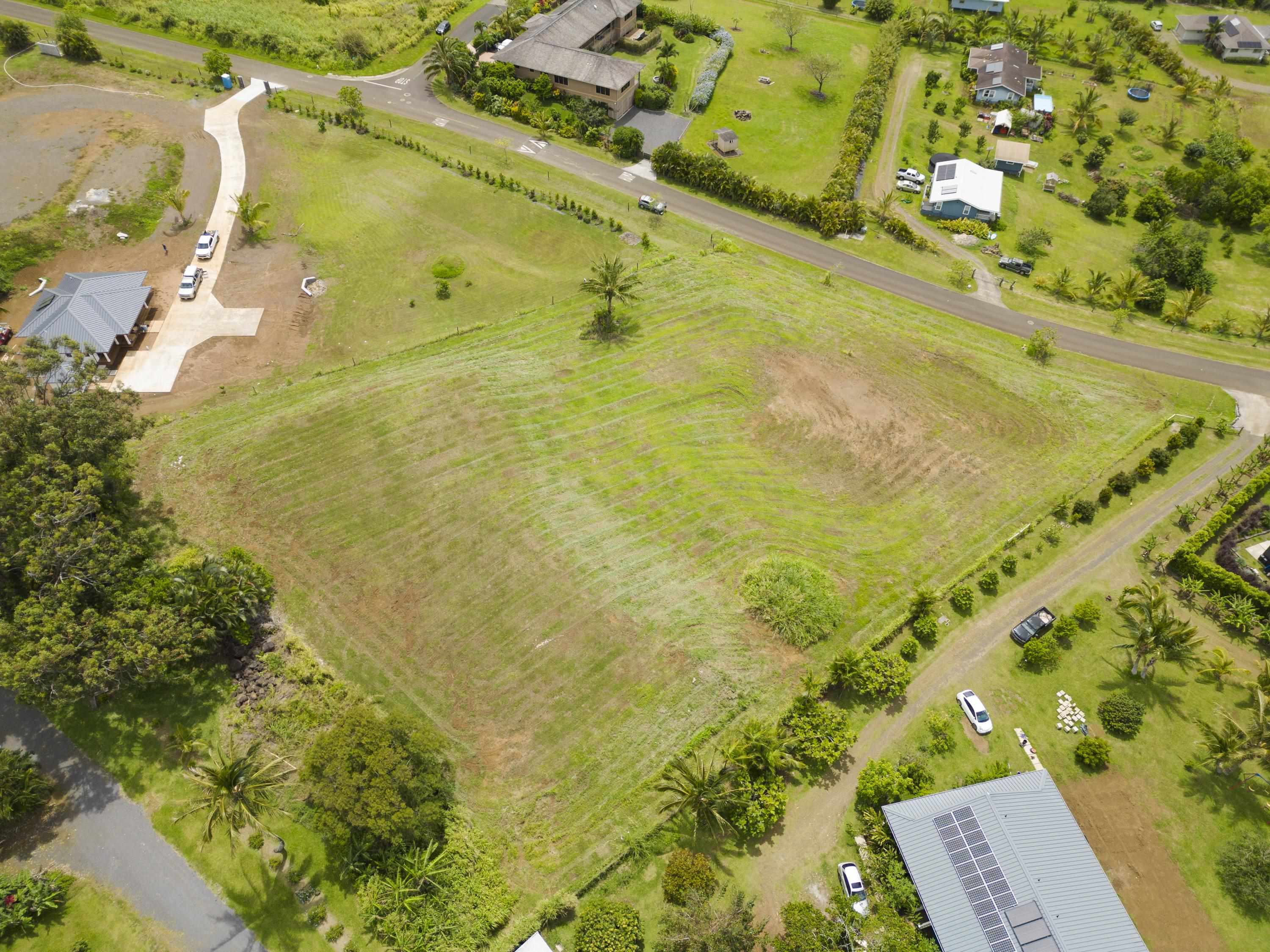 948 Hookili Road Haiku, HI 96708 - Photo 13 of 17 a view of a yard with an outdoor space