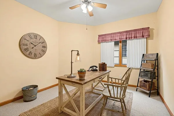 a kitchen with a sink stove and a refrigerator
