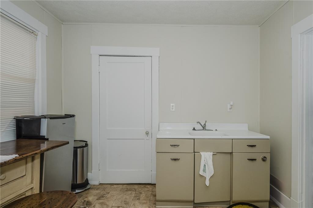 1302 Philadelphia Street Indiana, PA 15701 - Photo 14 of 30 a bathroom with a sink and a mirror