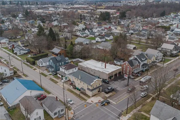 an aerial view of residential house with outdoor space
