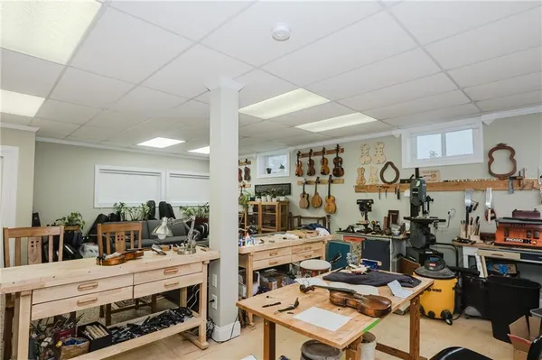 a room with lots of furniture and gym equipment