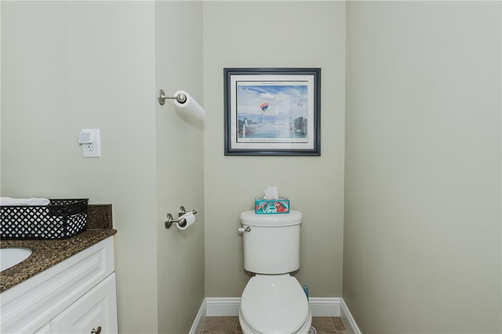 1302 Philadelphia Street Indiana, PA 15701 - Photo 6 of 30 a white toilet sitting next to a bathroom sink