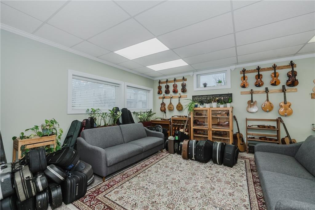 1302 Philadelphia Street Indiana, PA 15701 - Photo 10 of 30 a living room with furniture a rug and a flat screen tv