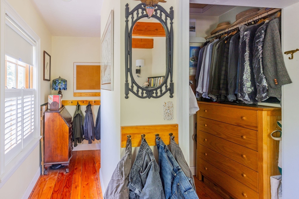 27 Maverick Street Marblehead, MA 01945 - Photo 10 of 31 a view of walk in closet with clothes and shoes