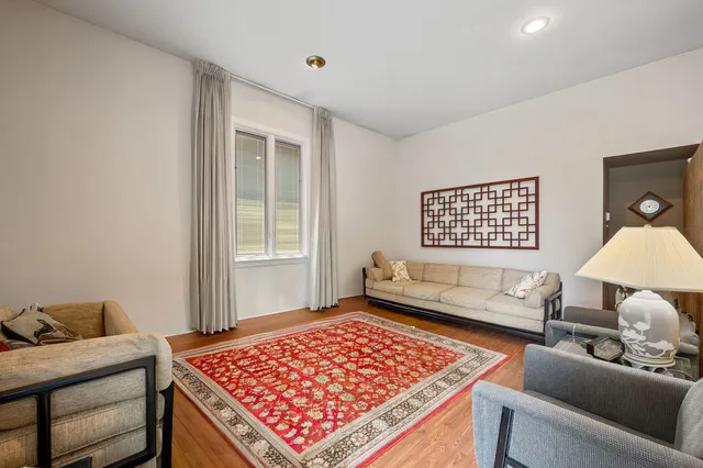 a bed room with a bed and a couch