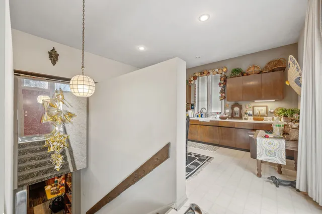 a view of a hallway and dining room
