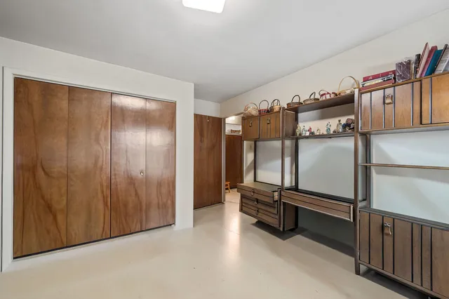 a view of a room with racks on the wall