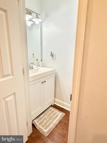 a view of a bathroom from the hallway