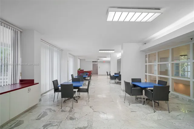 a workspace with furniture and a window