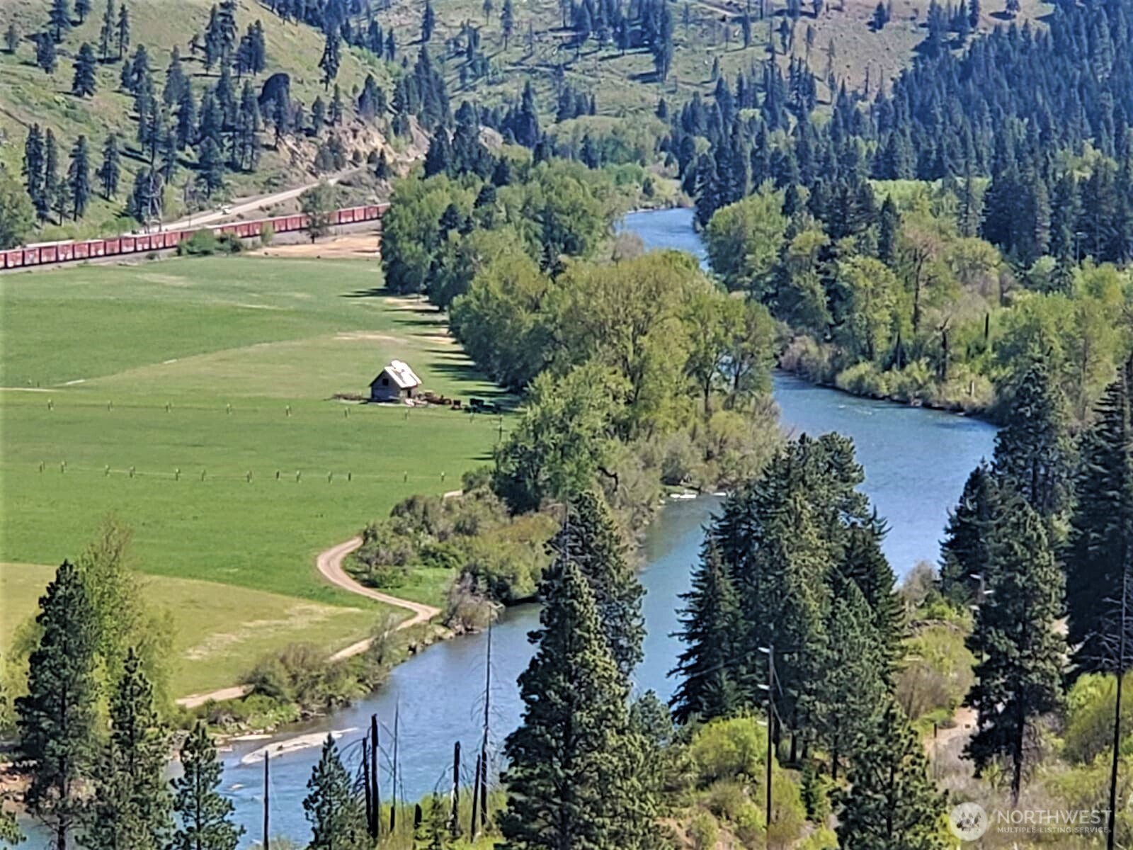an aerial view of a house with outdoor space