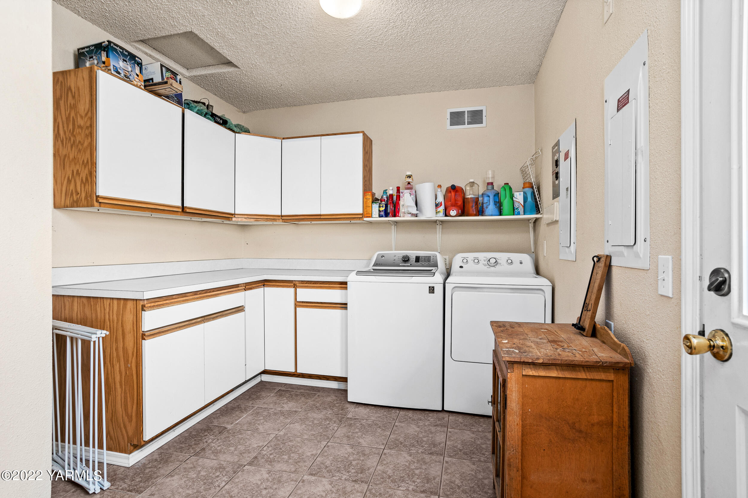 161 Track Road Cowiche, WA 98923 - Photo 32 of 51 a view of storage and utility room with washer and dryer
