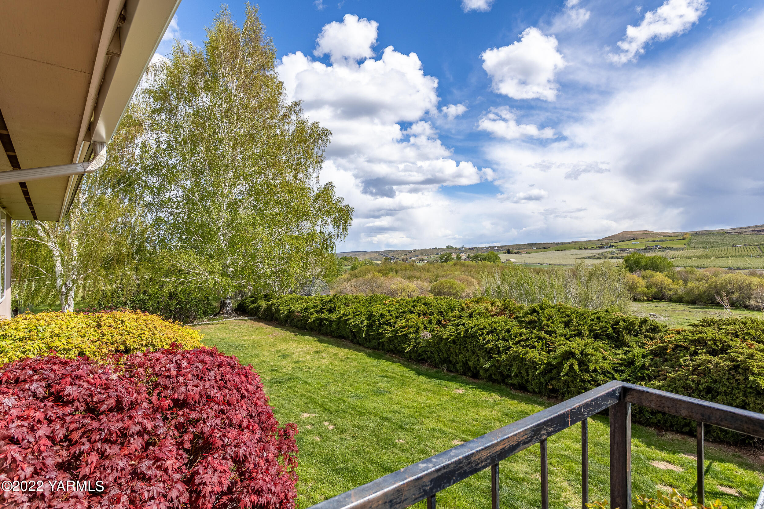 161 Track Road Cowiche, WA 98923 - Photo 5 of 51 a view of a yard with an outdoor seating