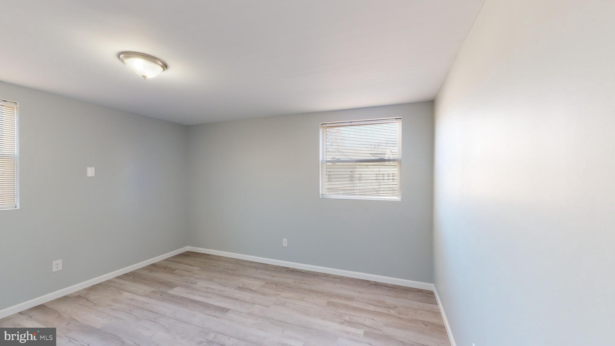 910 Gateway Boulevard, Unit C2 Westville, NJ 08093 - Photo 9 of 11 an empty room with a window