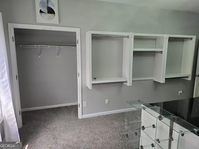 a kitchen with granite countertop a cabinets and a stove