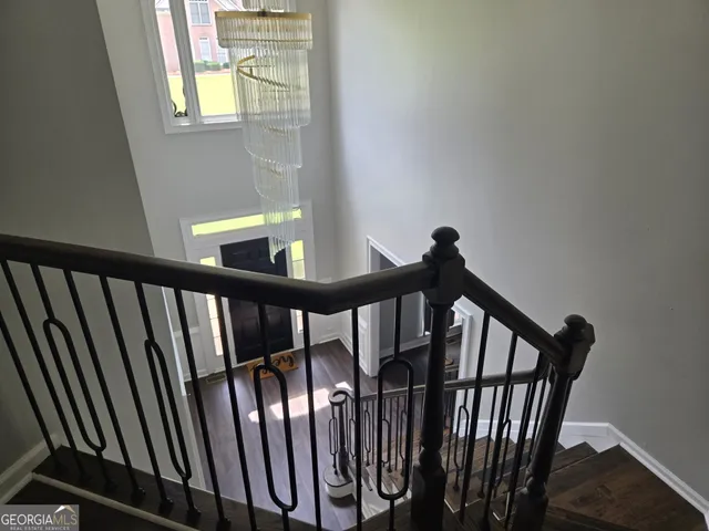 a view of entryway with wooden floor