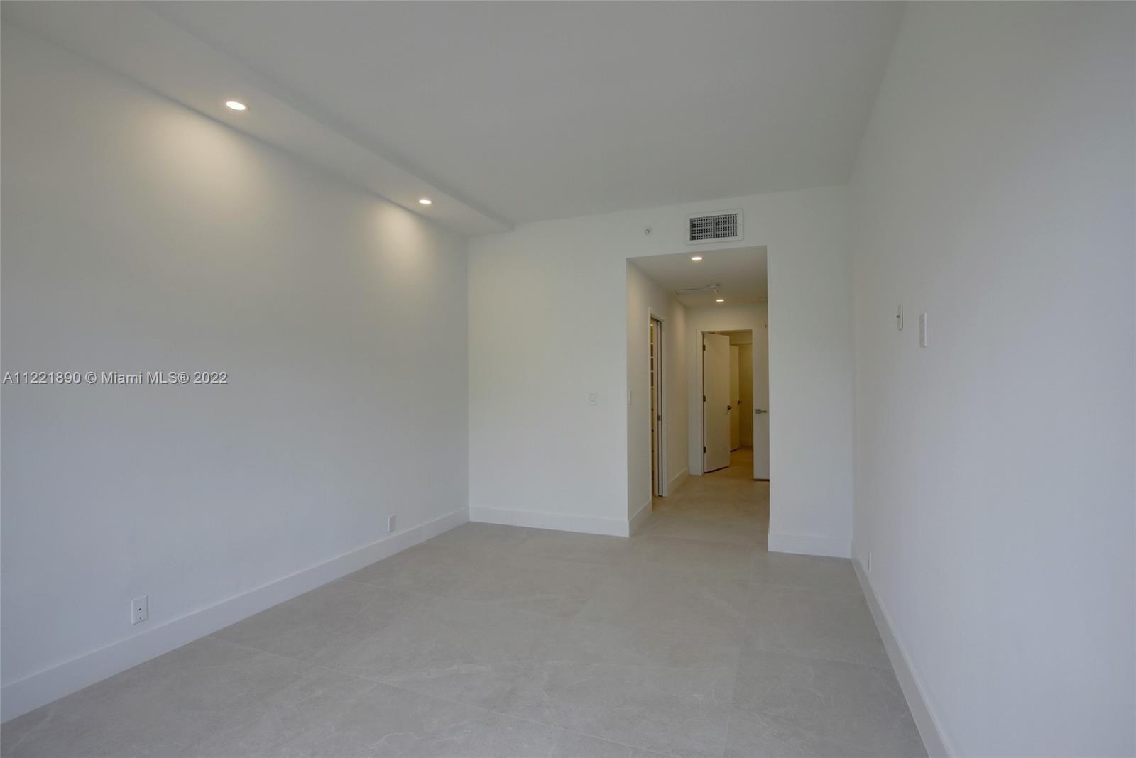 151 Crandon Boulevard, Unit 220 Key Biscayne, FL 33149 - Photo 4 of 16 a view of an empty room with a bathroom