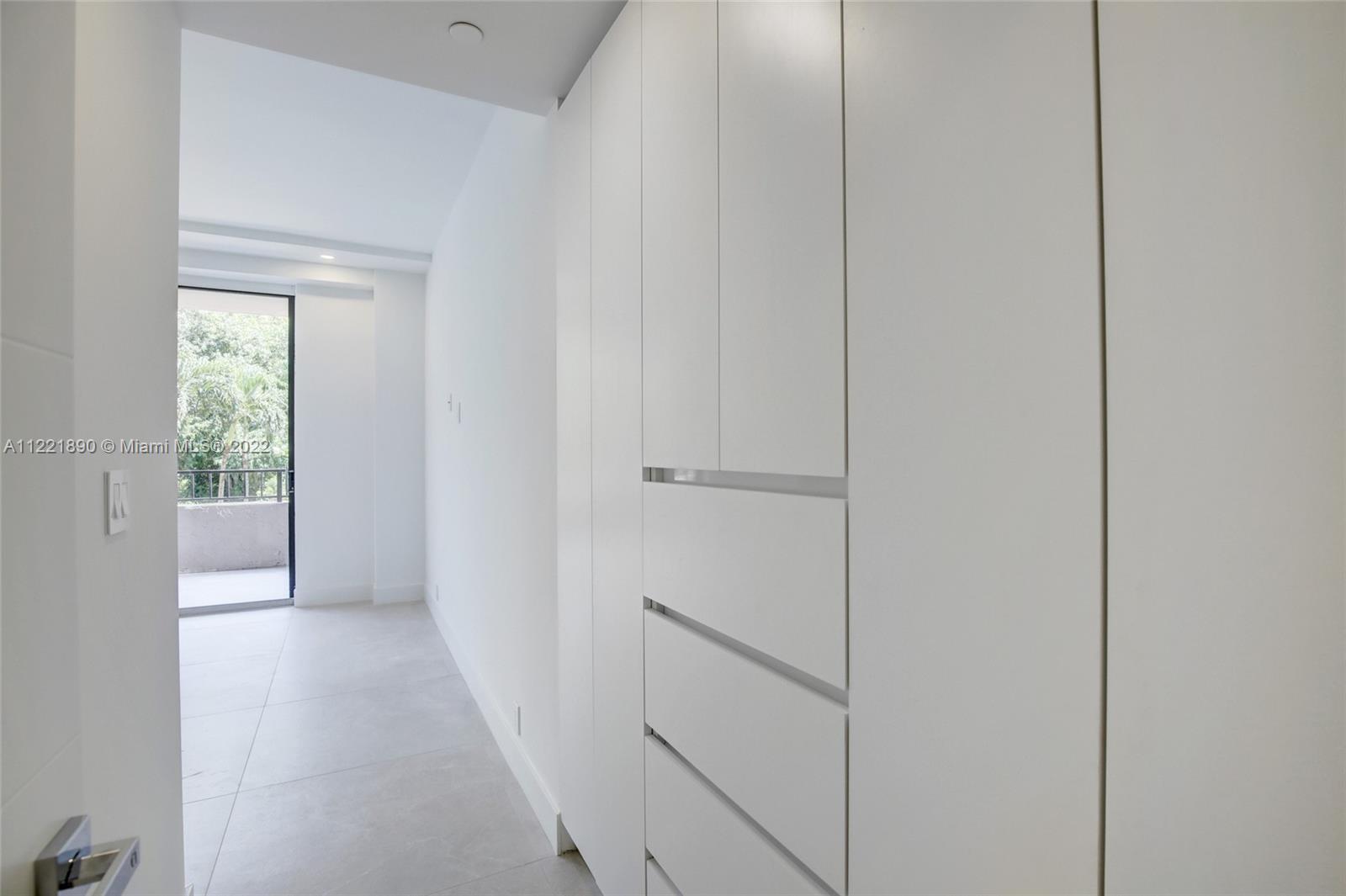 151 Crandon Boulevard, Unit 220 Key Biscayne, FL 33149 - Photo 8 of 16 a view of hallway with closet