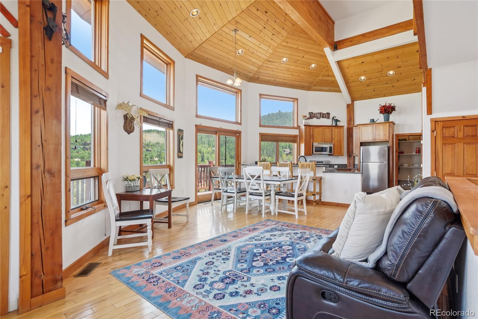 108 Hummingbird Way Granby, CO 80446 - Photo 3 of 46 a living room with furniture or outdoor view and a large window