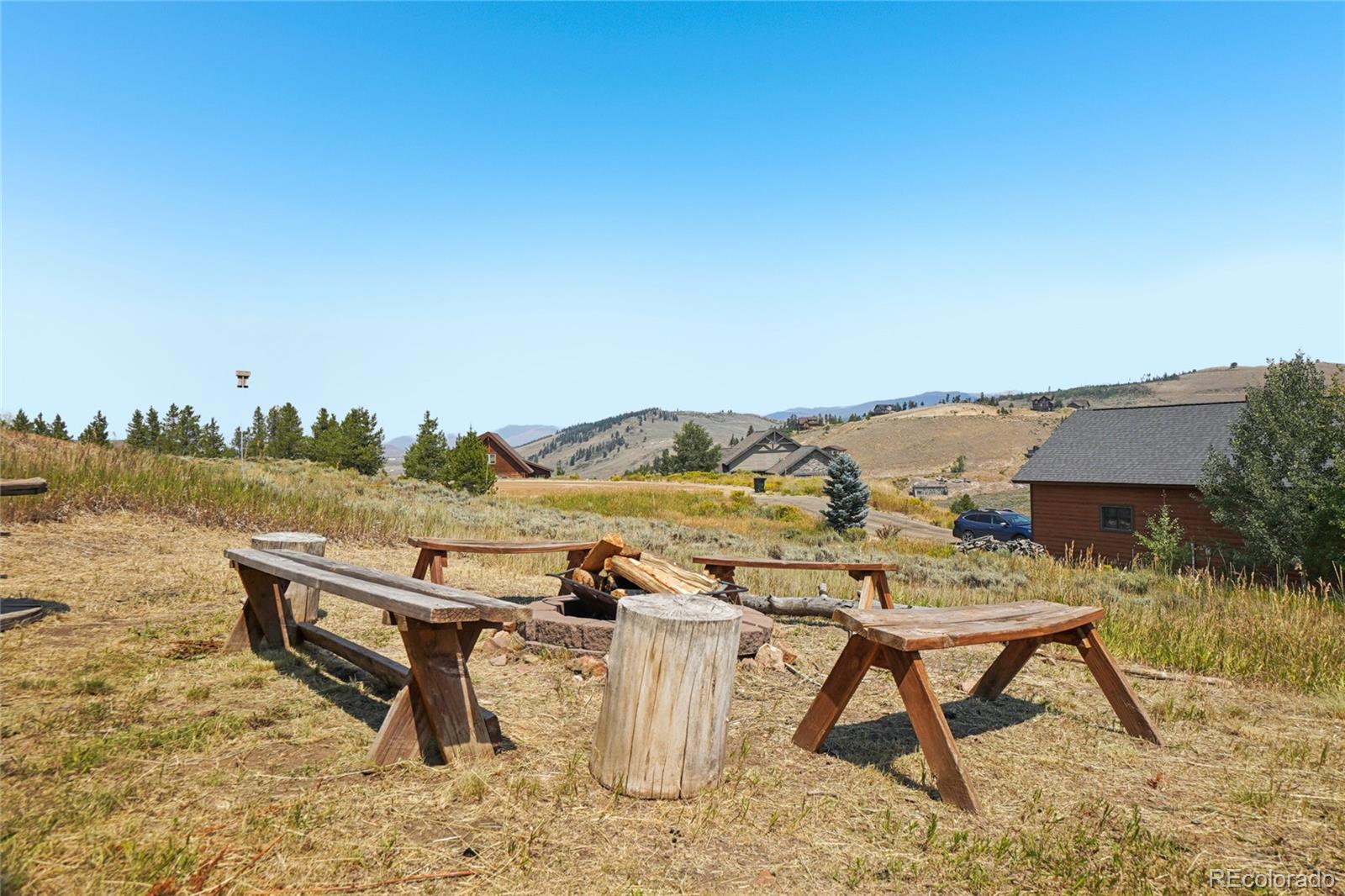 108 Hummingbird Way Granby, CO 80446 - Photo 35 of 46 a view of a terrace with chairs and wooden floor