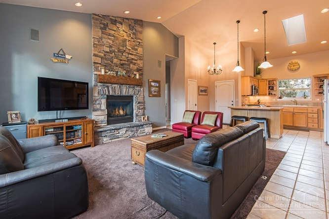 23095 Alfalfa Market Road Bend, OR 97701 - Photo 5 of 25 a living room with furniture and a fireplace