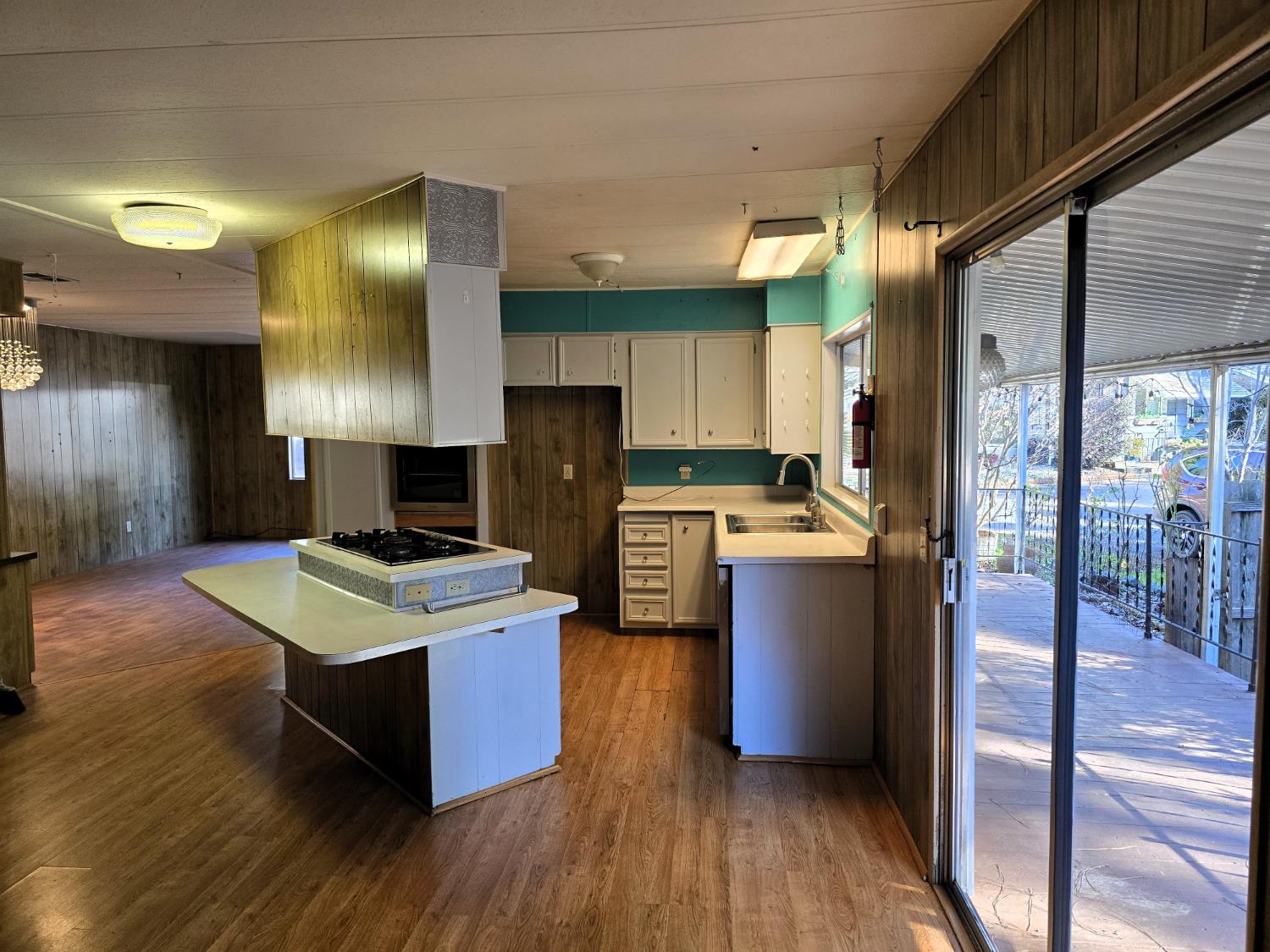 30 Candy Lane Grass Valley, CA 95945 - Photo 11 of 48 a kitchen with a stove a refrigerator and a stove top oven