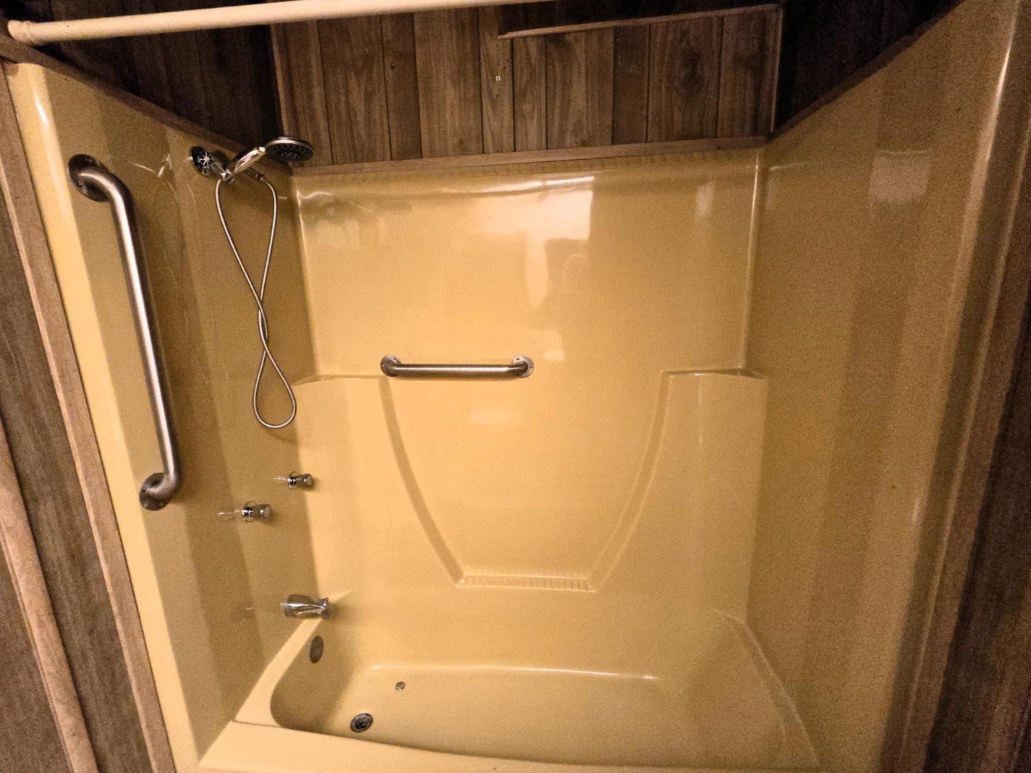 30 Candy Lane Grass Valley, CA 95945 - Photo 13 of 48 a bathroom with a shower and a tub