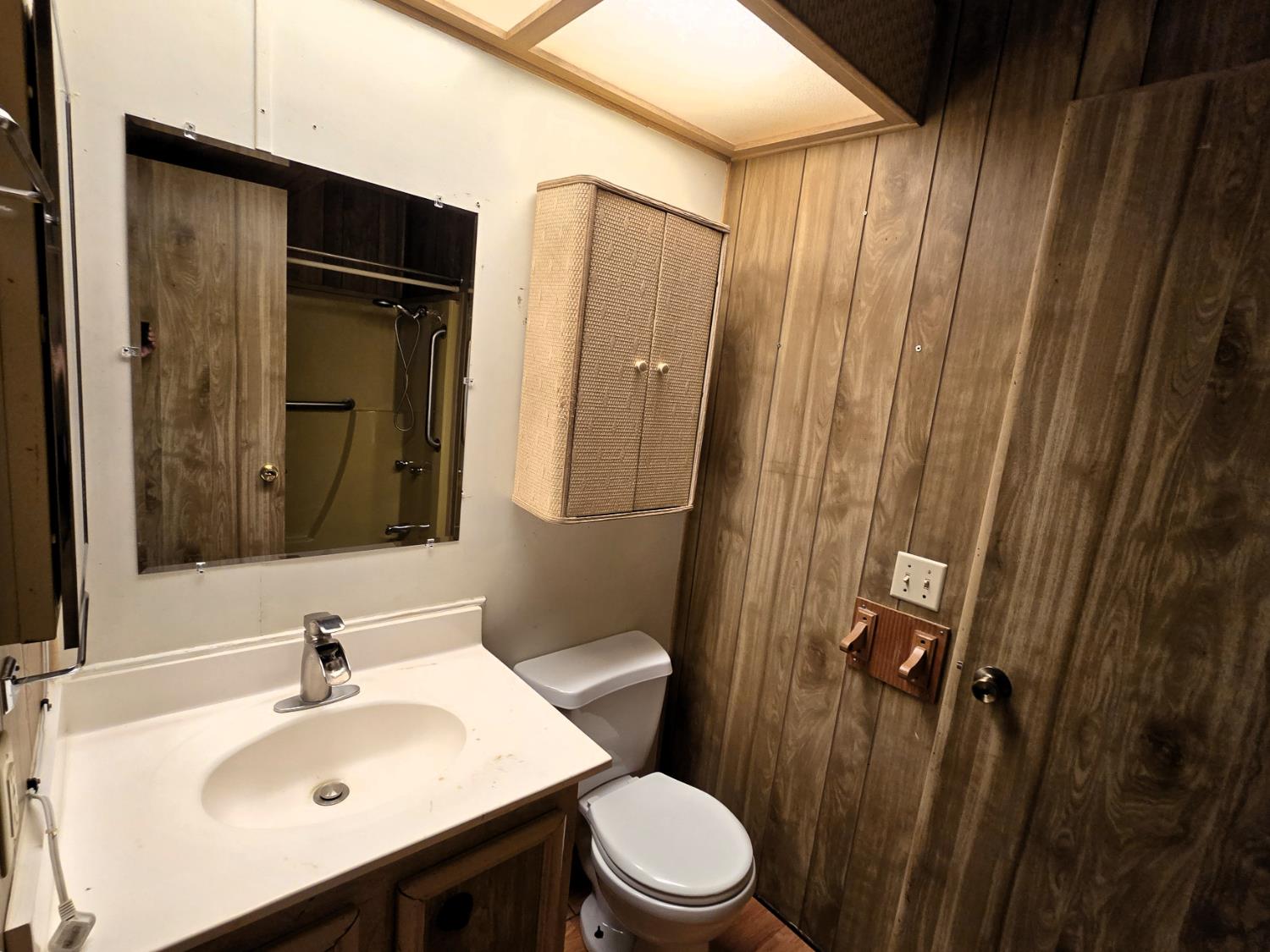 30 Candy Lane Grass Valley, CA 95945 - Photo 14 of 48 a bathroom with a sink a toilet and shower