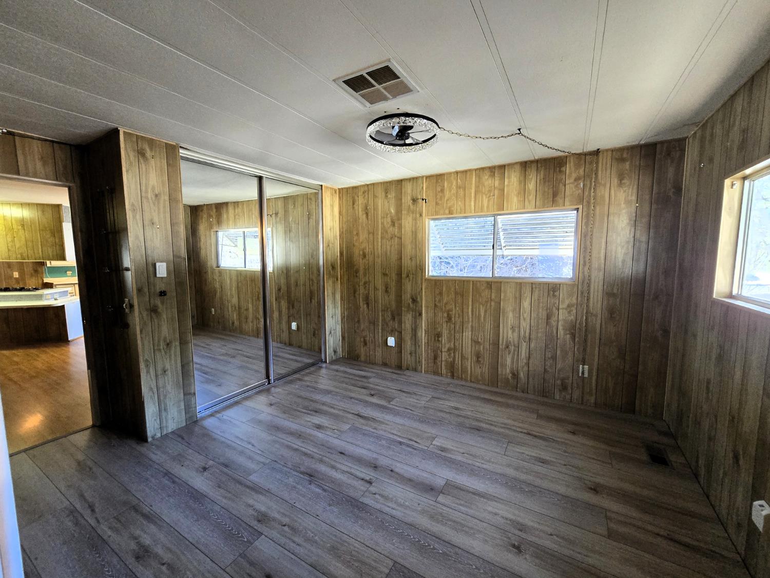 30 Candy Lane Grass Valley, CA 95945 - Photo 25 of 48 a view of a hallway with wooden floor and a bathroom