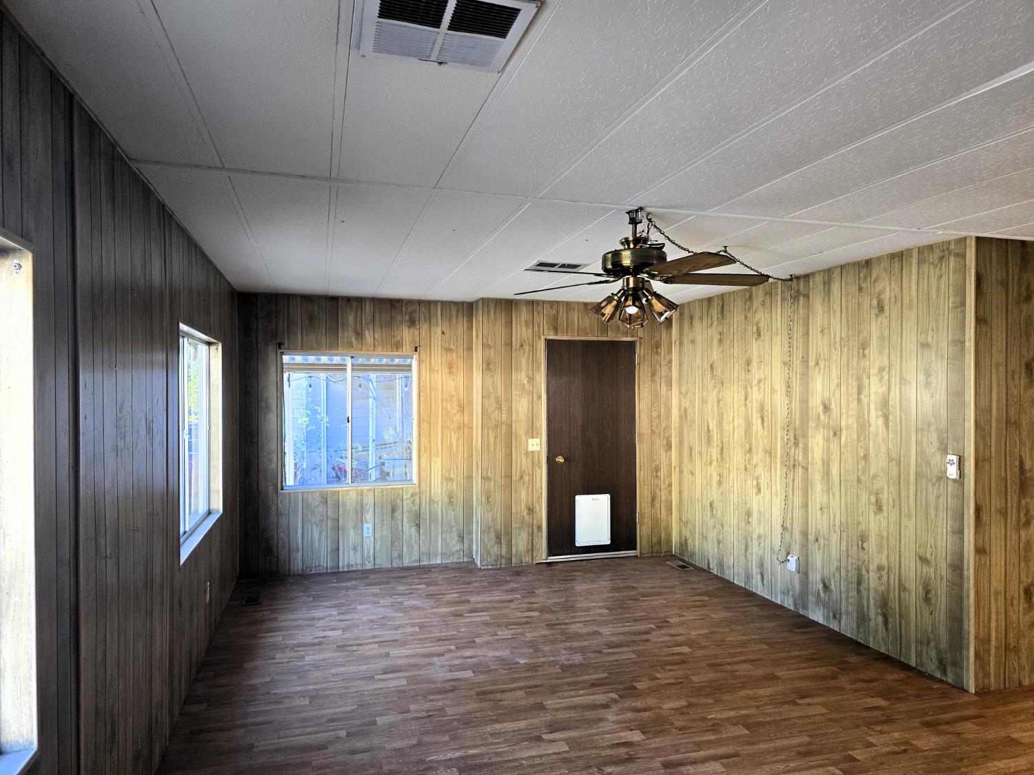 30 Candy Lane Grass Valley, CA 95945 - Photo 4 of 48 wooden floor in an empty room with a window