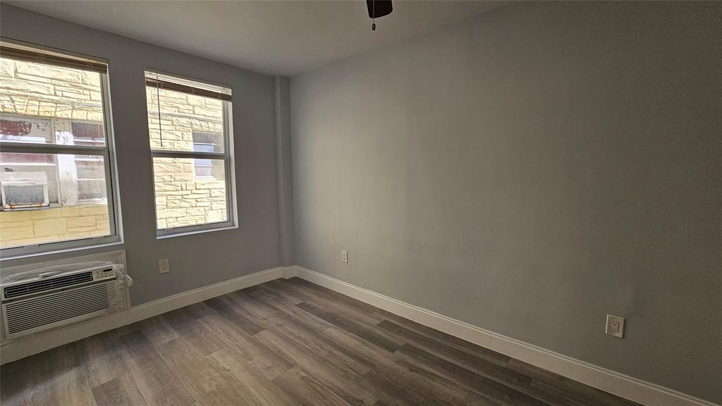 1142 Southwest 4th Street, Unit 3 Miami, FL 33130 - Photo 15 of 17 an empty room with a window