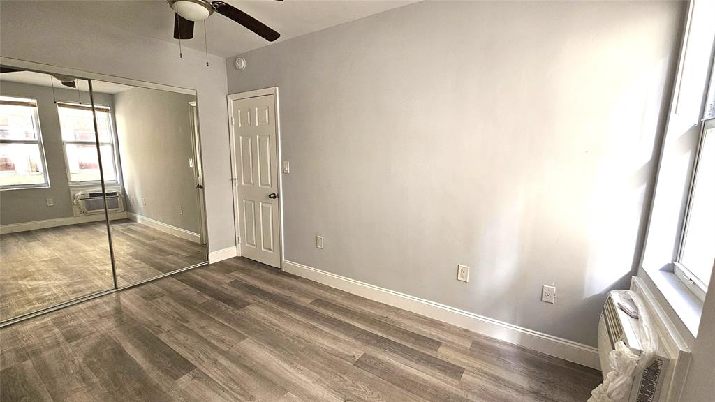 1142 Southwest 4th Street, Unit 3 Miami, FL 33130 - Photo 7 of 17 a view of an empty room and window