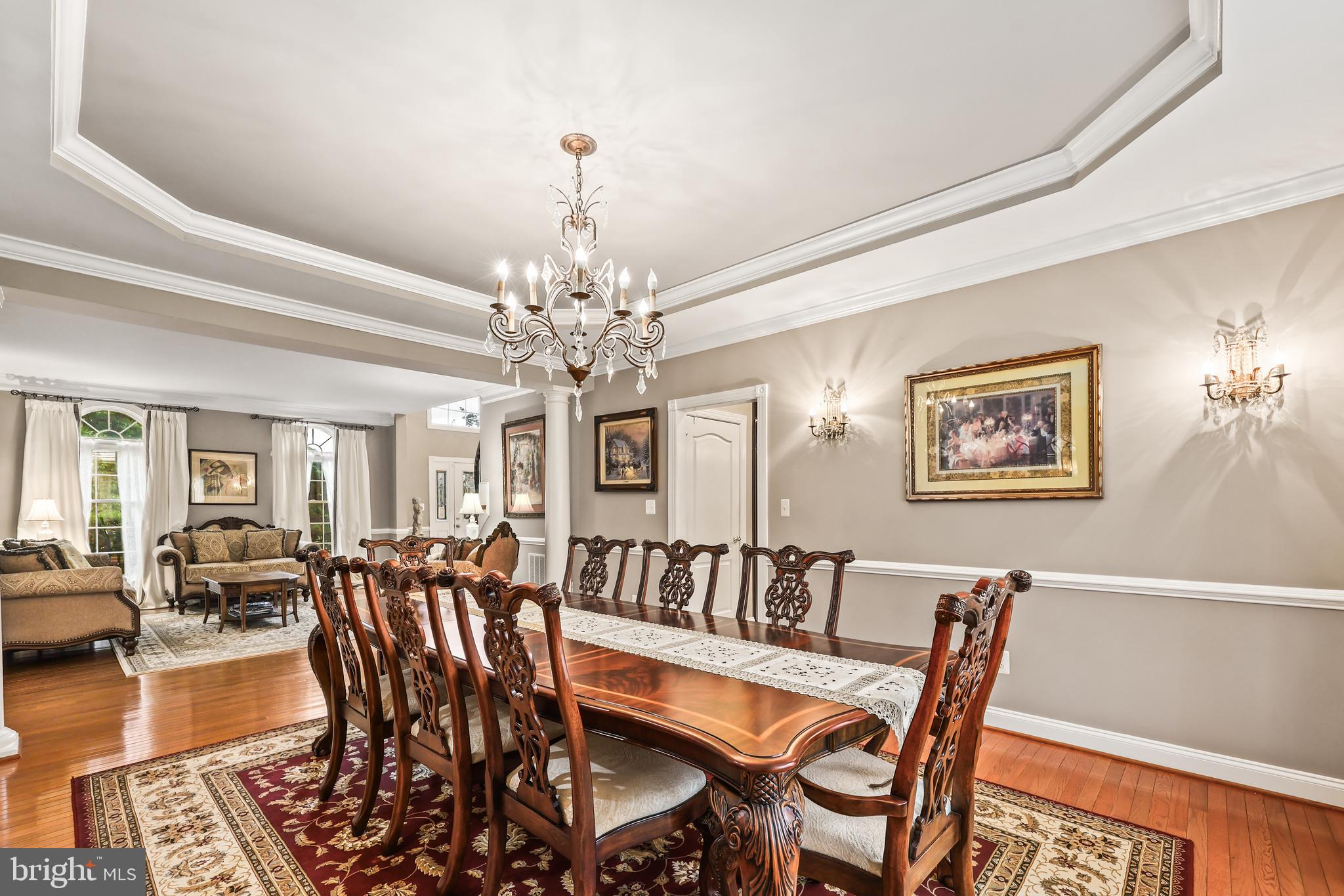 40890 Beechnut Road Leesburg, VA 20175 - Photo 12 of 65 a view of a dining room with furniture and wooden floor