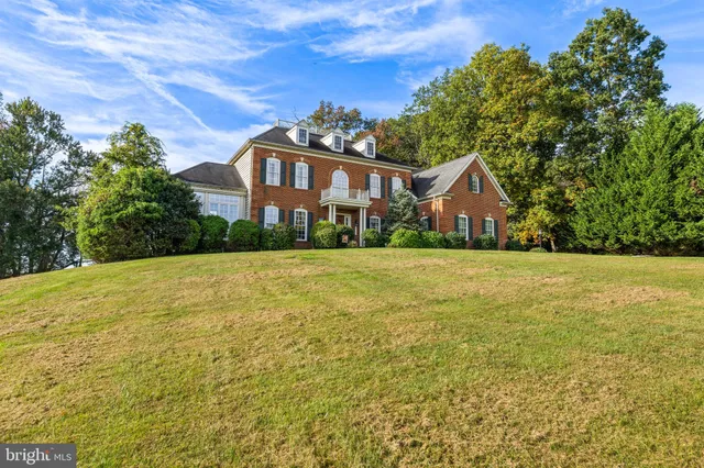 a front view of a building with garden