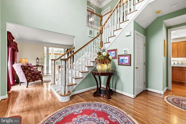 a view of a livingroom with furniture and a window