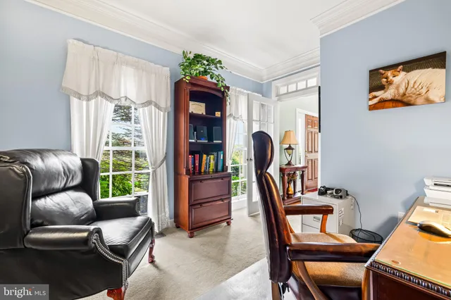 a view of a workspace with furniture