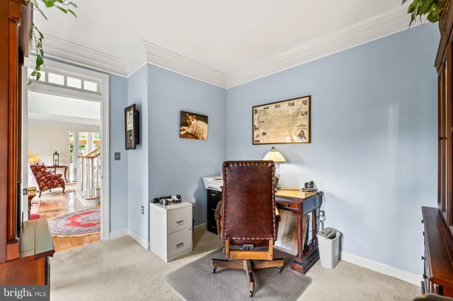 a bathroom with a sink mirror and vanity