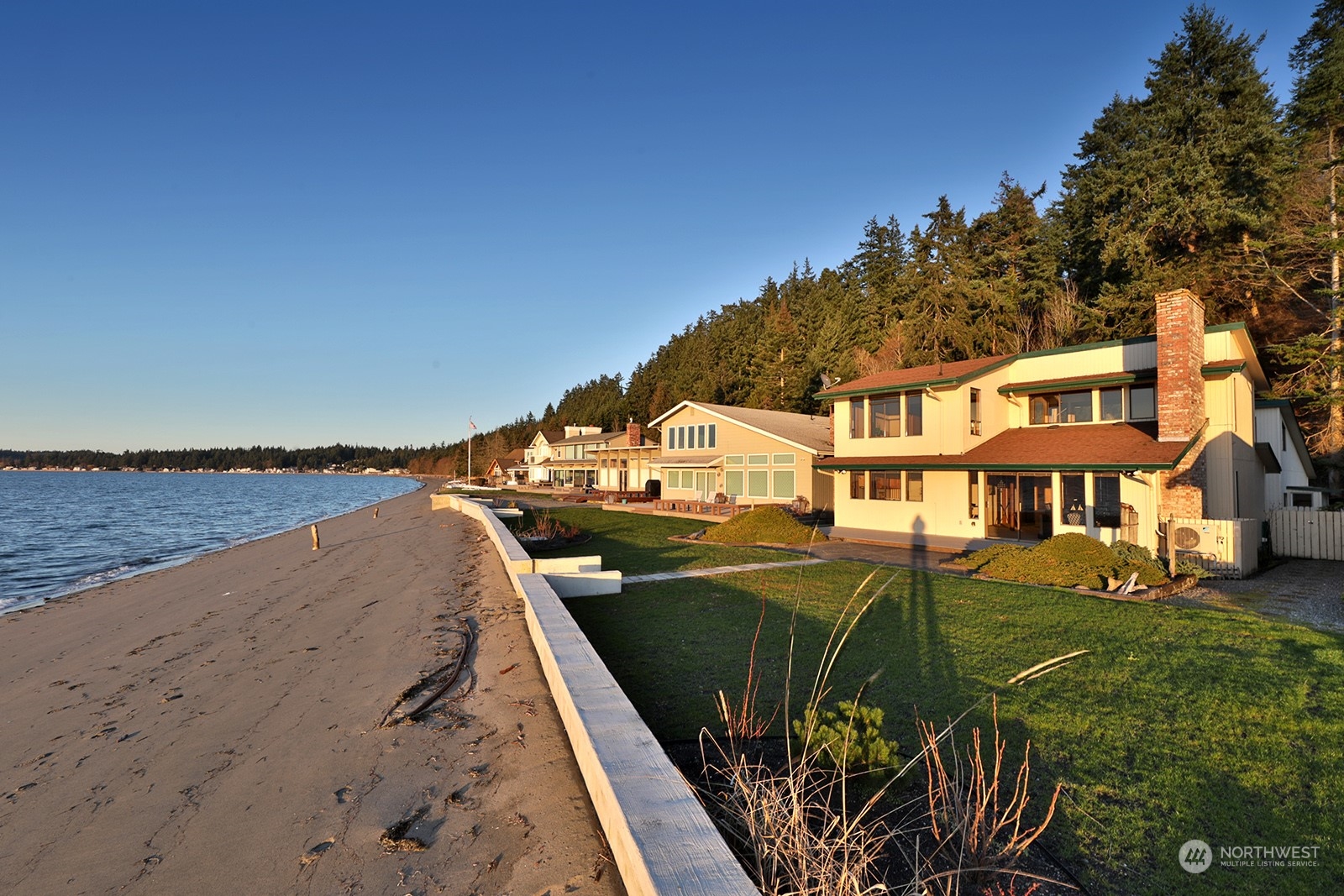 6288 Barr Beach Road Freeland, WA 98249 - Photo 2 of 40 a view of a house with a yard