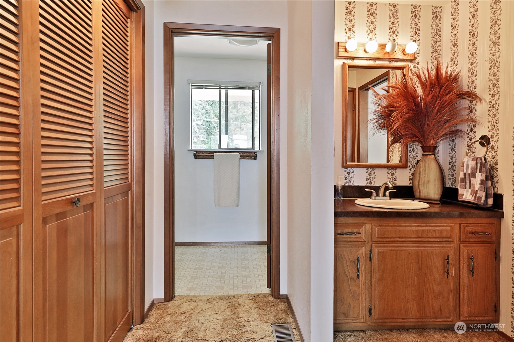 6288 Barr Beach Road Freeland, WA 98249 - Photo 24 of 40 a view of a kitchen from a hallway