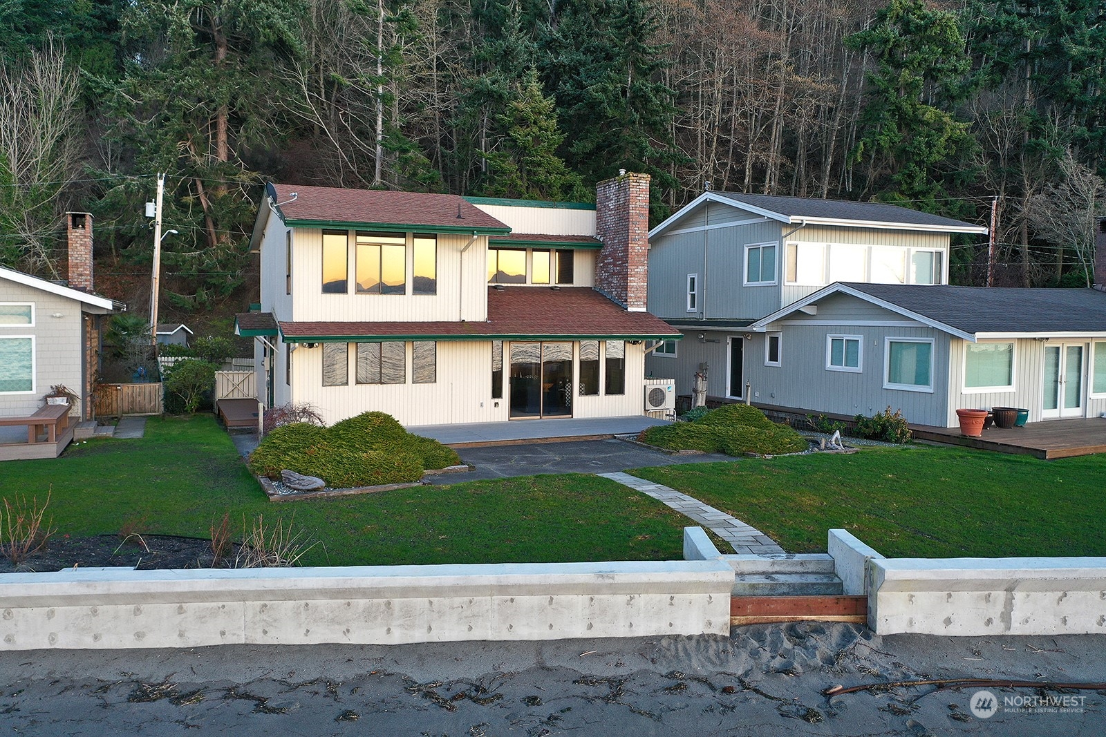 6288 Barr Beach Road Freeland, WA 98249 - Photo 5 of 40 a front view of a house with a yard