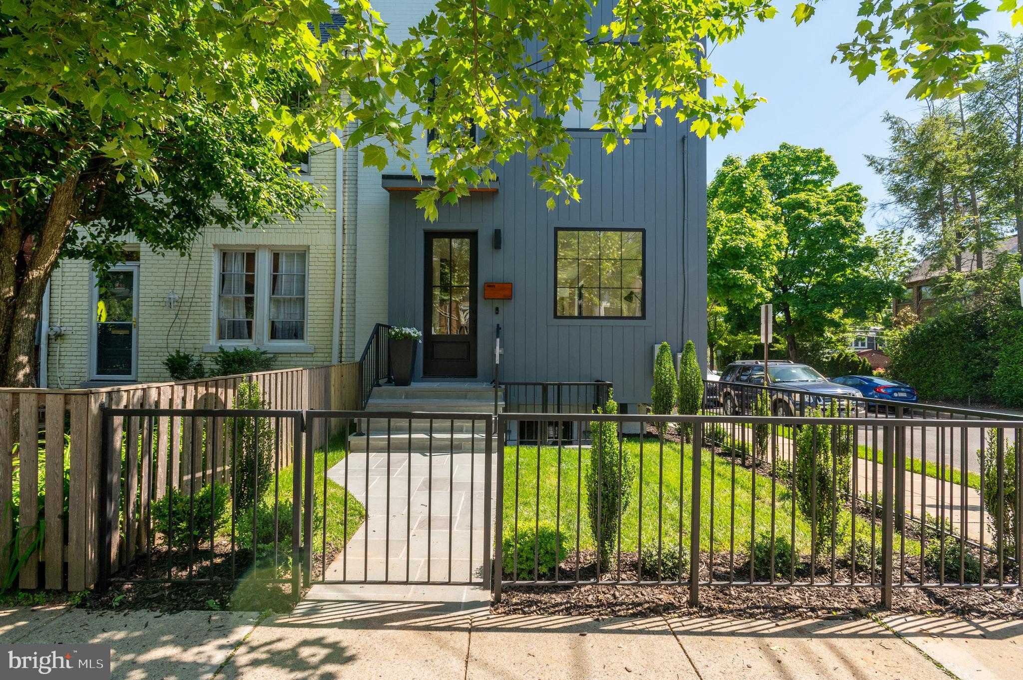 3554 T Street Northwest Washington, DC 20007 - Photo 54 of 57 a front view of a house with a garden