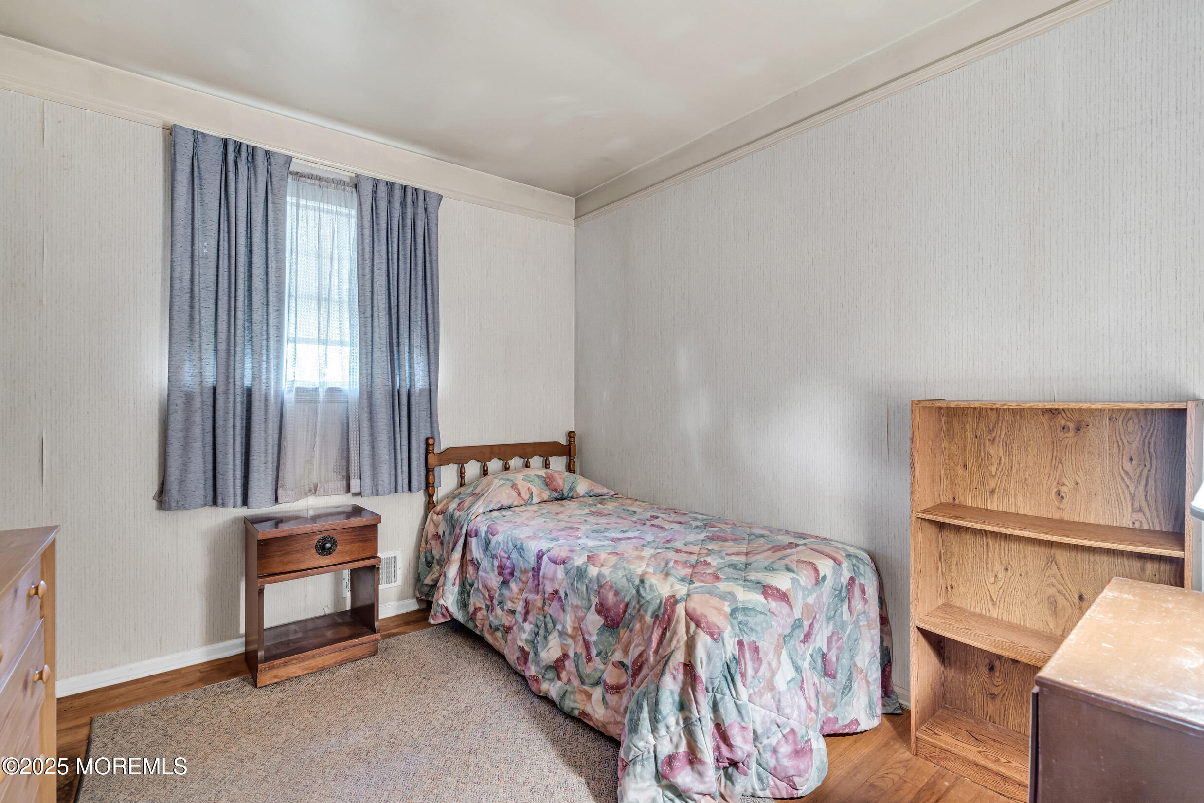 30 Russell Street Toms River, NJ 08753 - Photo 12 of 27 a bedroom with a bed and a lamp with window