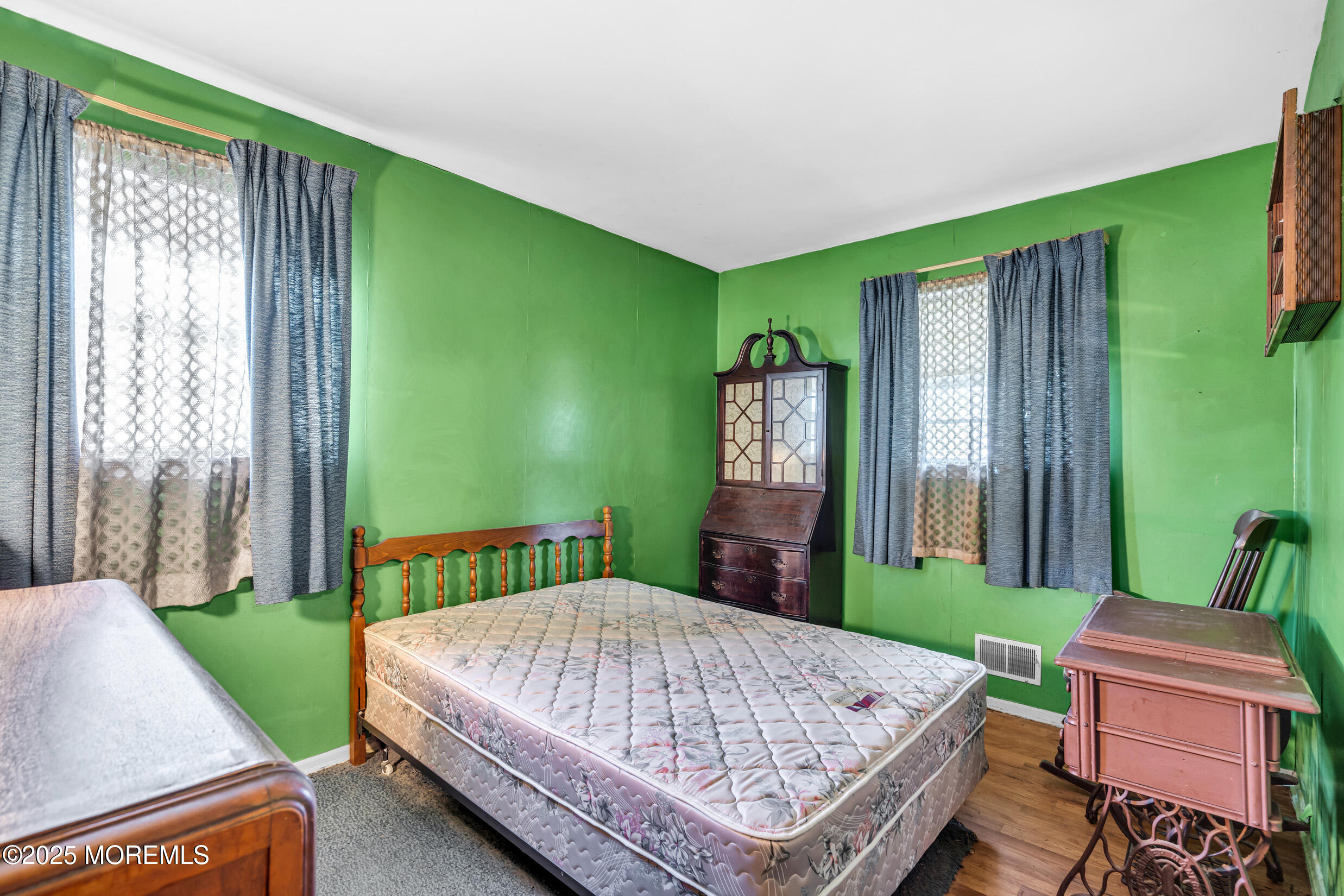 30 Russell Street Toms River, NJ 08753 - Photo 14 of 27 a bed sitting in a bedroom next to a window