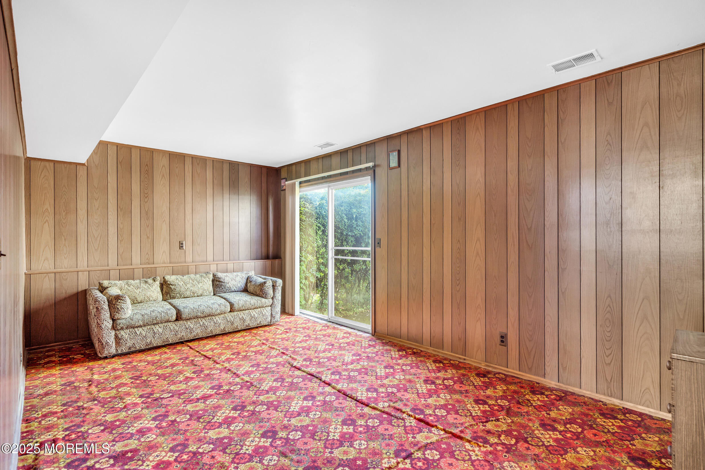 30 Russell Street Toms River, NJ 08753 - Photo 17 of 27 a living room with furniture and large windows