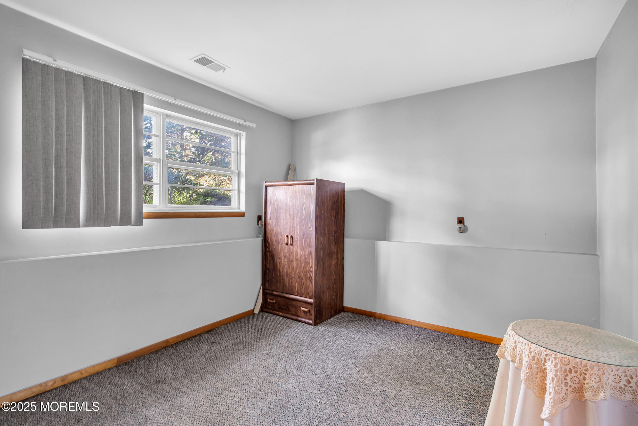 30 Russell Street Toms River, NJ 08753 - Photo 19 of 27 a view of room with closet and windows