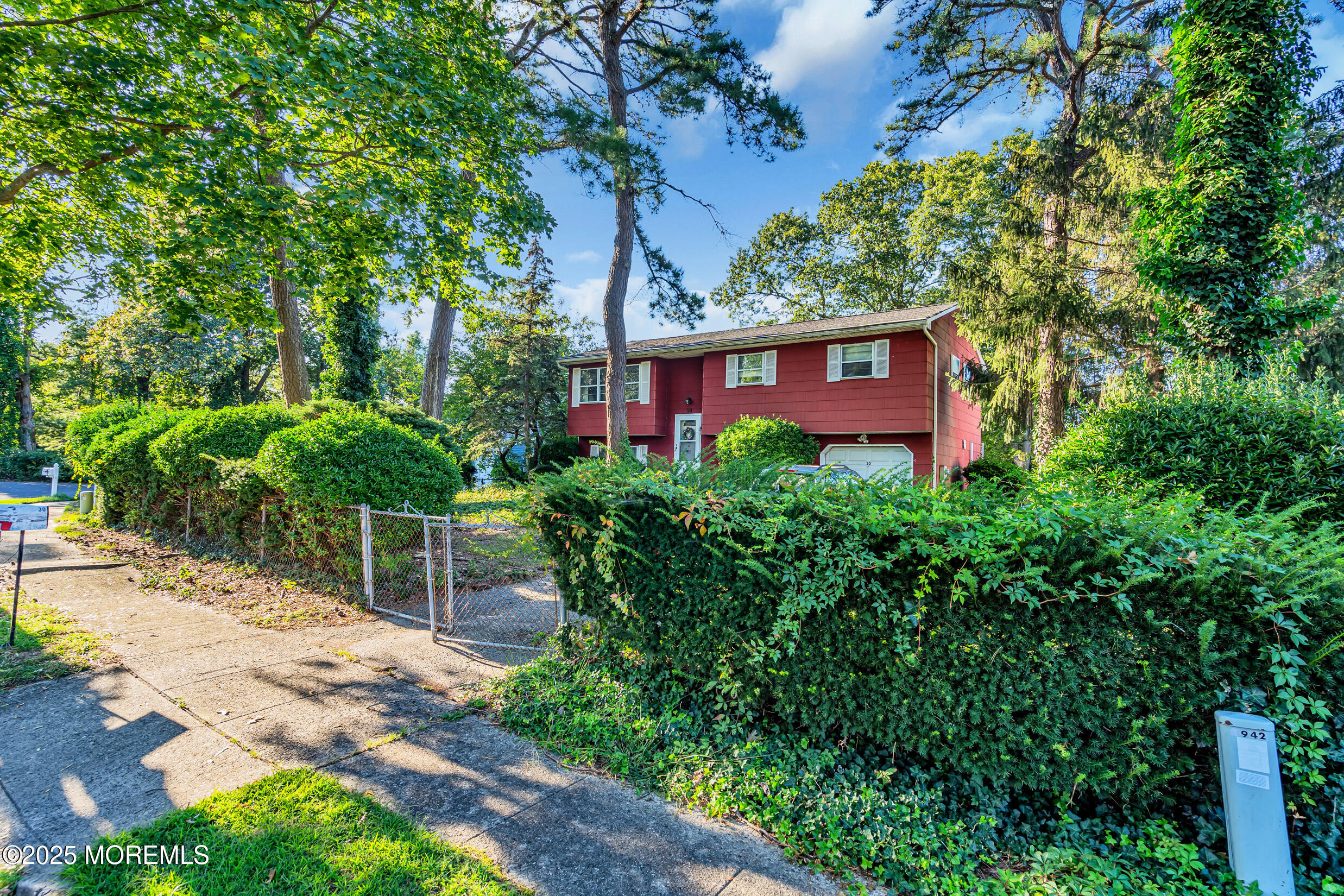 30 Russell Street Toms River, NJ 08753 - Photo 23 of 27 a view of a house with a tree in front of it
